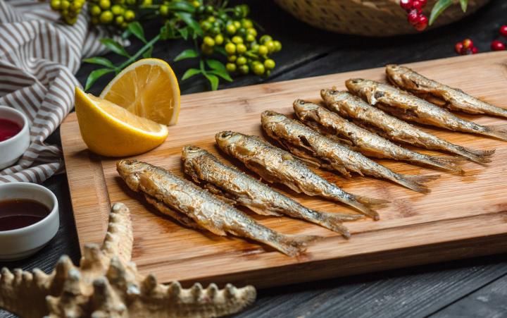 fried-fishes-set-wooden-board.jpg