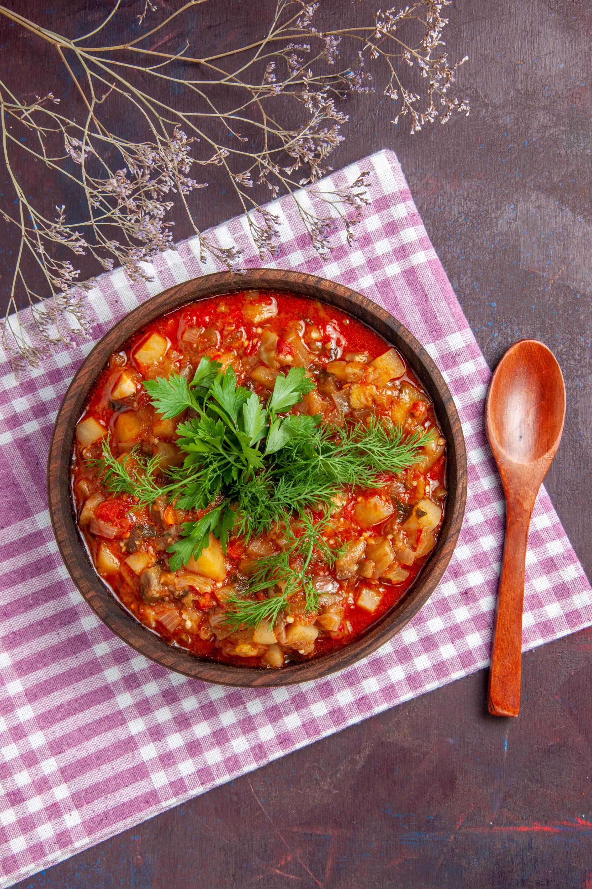 top-view-tasty-cooked-vegetables-sauce-meal-with-greens-dark-surface-sauce-meal-dish-food.jpg